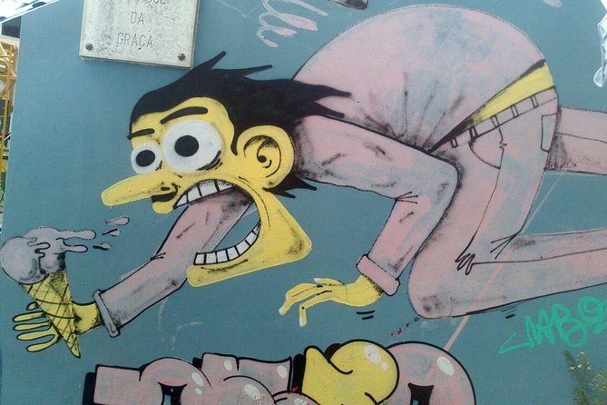 Lisbon Street Art Walking Tour - Meeting at Praça Martim Moniz and How the Walk Unfolds