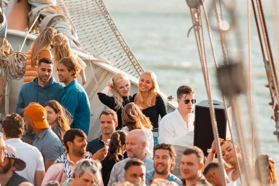 Lisbon: Sunset Boat Party Cruise with Music & Drinks - Weather and comfort: what to pack for a windy river evening