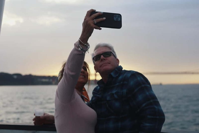 Lisbon: Sunset Boat Tour with Music and Drinks - Alfama, the steep old-town feel, seen from the river