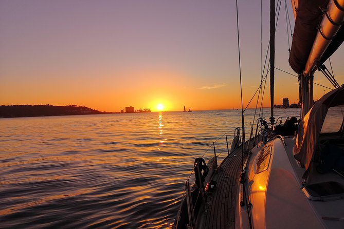Lisbon Sunset Sailing Tour on Luxury Sailing Yacht with 2 Drinks - The halfway snack and drink stop that turns sightseeing into a moment