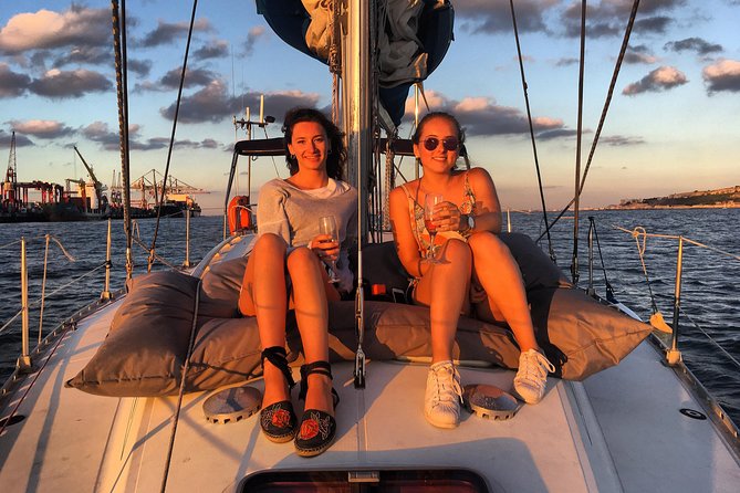 Lisbon Sunset Sailing Tour with White or Rosé Wine and Snacks - Crew stories, music, and whether it feels like a “proper tour”