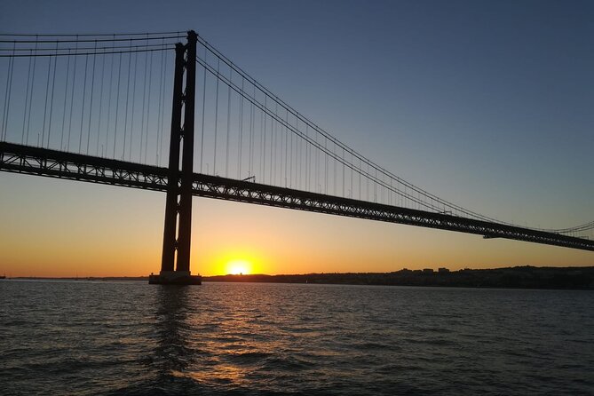 Lisbon: Sunset Sailing with Portuguese Wine and History - Cristo Rei from the water: a different angle on the skyline