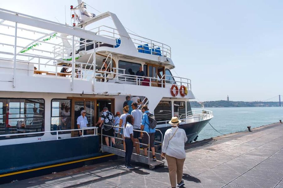 Lisbon: Tagus River Cruise with Welcome Drink - Where to sit on board: sundeck limits, wind, and comfort