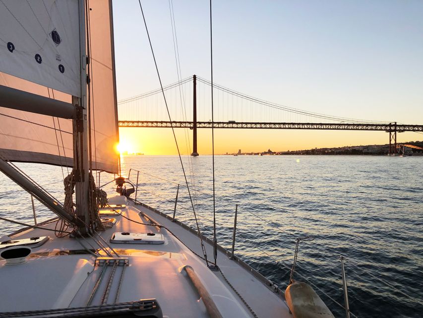 Lisbon: Tagus River Sunset Cruise with Drinks - Belém Tower and the Monument to the Discoveries: the Tagus does the framing