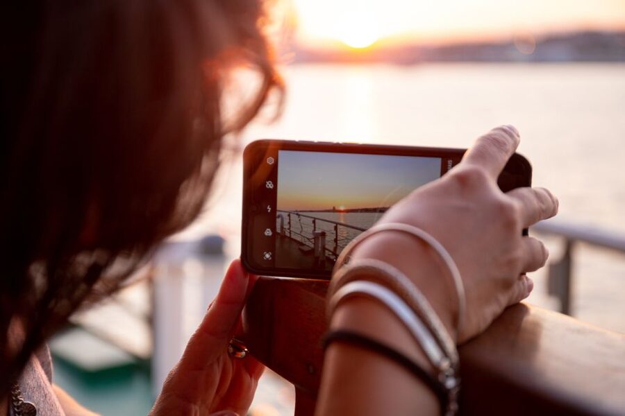 Lisbon: Tagus River Sunset Tour with Snacks and Drink - Christ the King from the water, a Lisbon landmark with a different mood