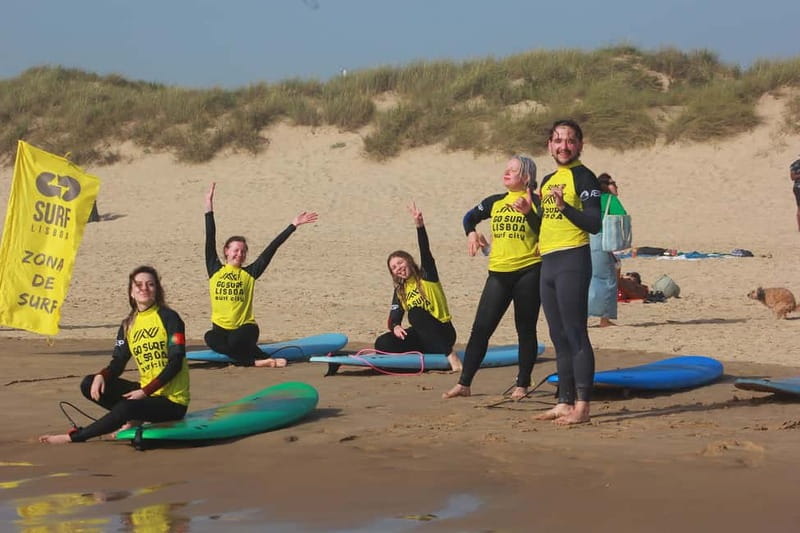 Lisbon: The Surf Instructor - surf lessons with transfer - Photographer moments and the beach club factor at Praia do Castelo