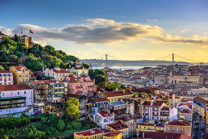 Lisbon to Porto Up to 4 Stops: Obidos, Nazare, Fatima and Aveiro - Óbidos: medieval walls, white houses with flowers, and a cherry liqueur ritual
