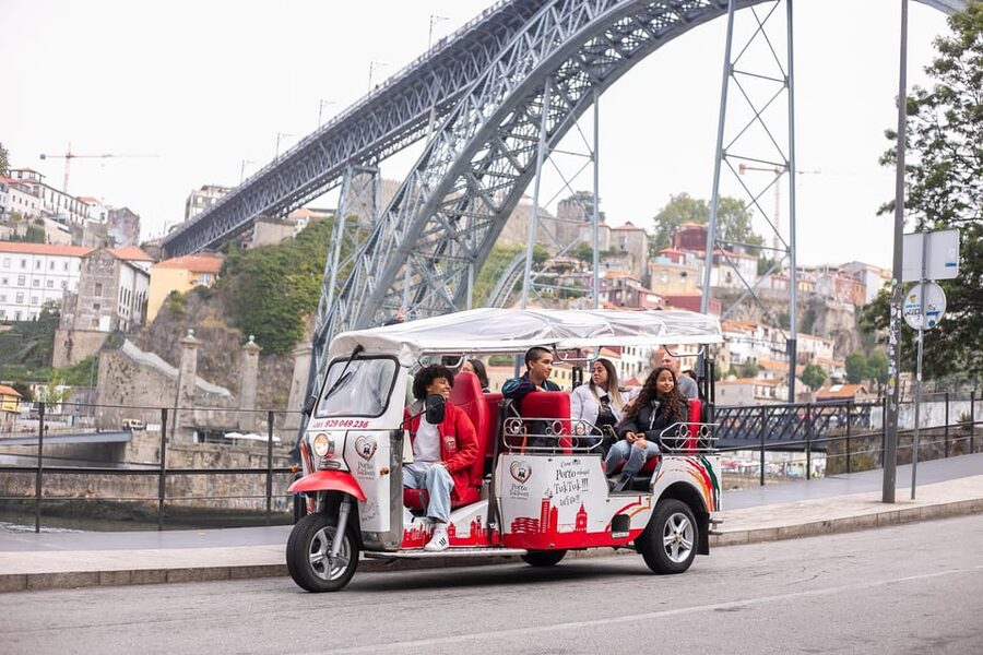 Oporto Tuk-Tuk Tour: Fast, Fun & Flexible – 1H to Full Day! - Clérigos Tower and Praça da Batalha: famous landmarks, fast context