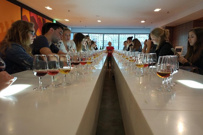 Port Wine Lodges Tour Including 7 Port Wine Tastings (English) - The Old Cellar Interactive Center: Barrels, Cork Production, and Ruby Port