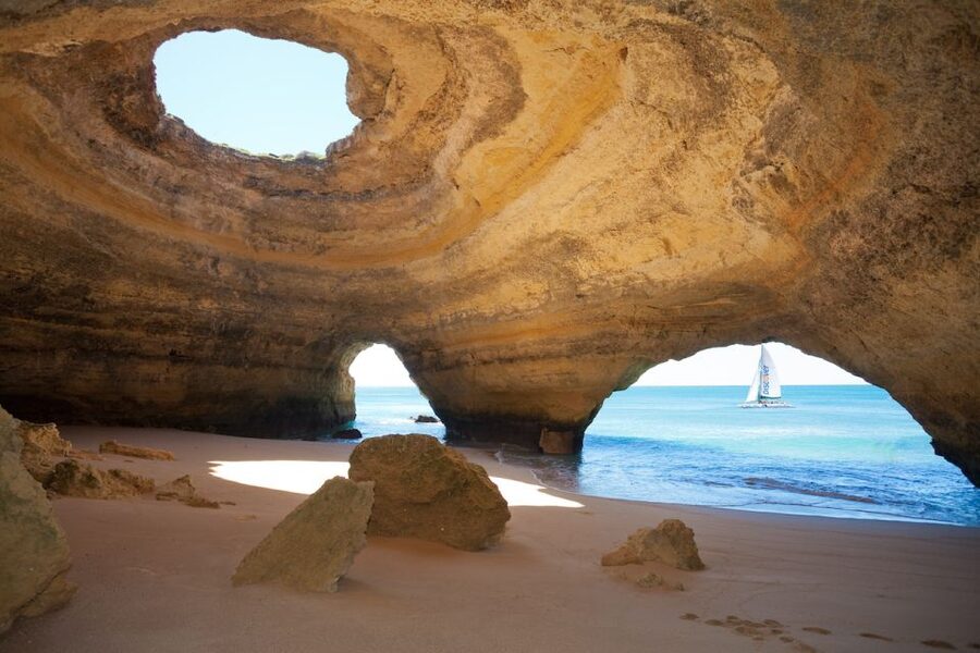 Portimao: Benagil Caves & Coastline Cruise - The swim stop and water play in a secluded bay