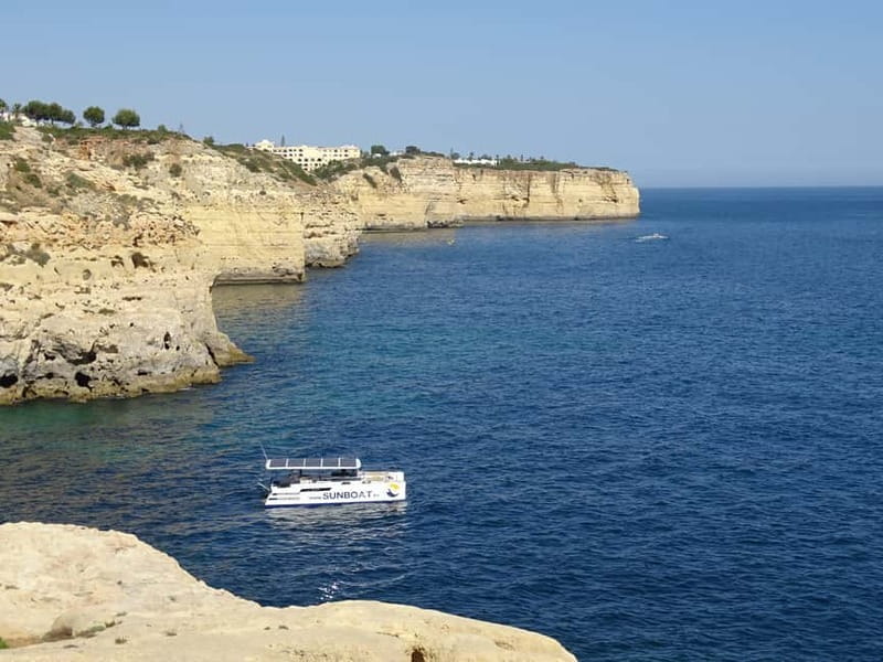 Portimão: Benagil Caves & Golden Coast Eco Catamaran Tour - Swim stop rules: June to September, and the sunset exception
