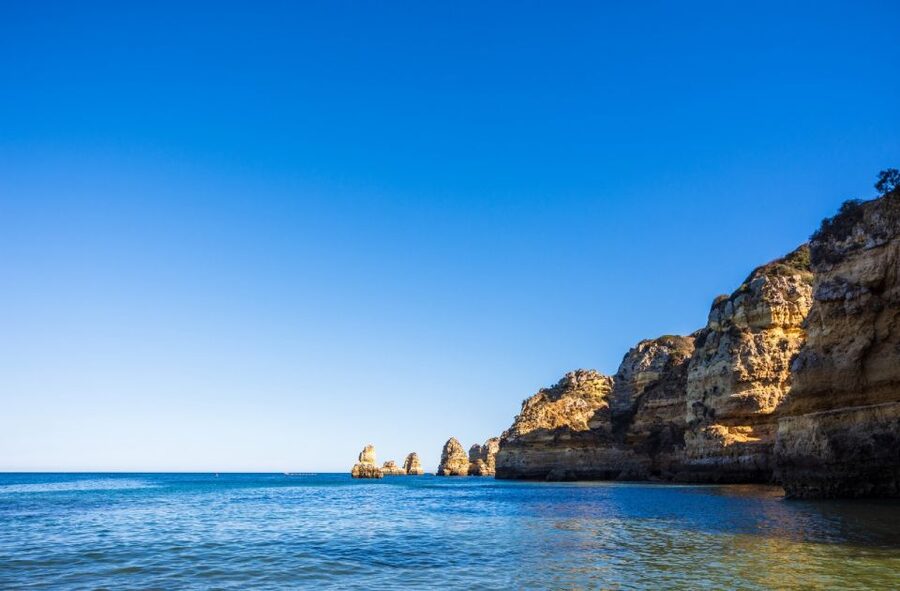 Portimão: Carvalho & Marinha Beach, Benagil Cave Boat Tour - Entering Benagil Sea Cave, the lightbeam moment and the rules you can’t skip