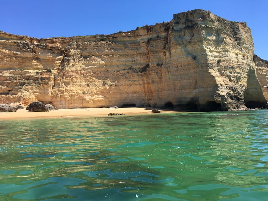 Portimão: Caves, Benagil and Algarve Coastline Boat Tour - The onboard Champagne or soda toast after the water time