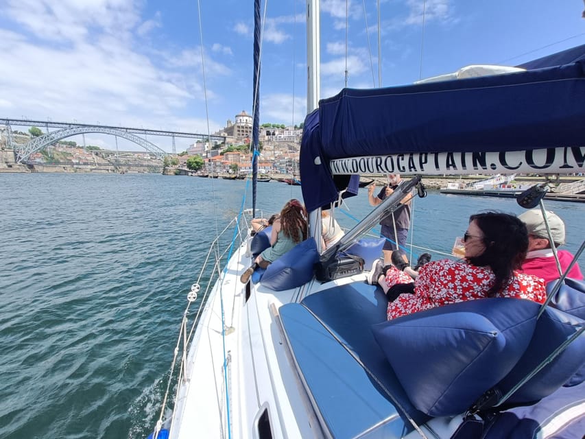 Porto: Charming Sailboat Cruise with Port Wine,Sunset Option - Dom Luis I Bridge Photo Stop, Sé and Clérigos Tower Views