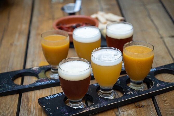 Porto Craft Beer Tour: 7 Beers + 3 Food Pairings in a Small Group - Stop 1: Armazem da Cerveja, the Porto beer warehouse vibe