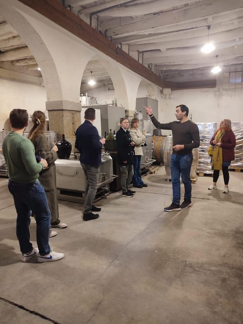 Porto: Port and Douro Wine Walking Tour with 9 Tastings - Stop 3: Solar dos Dragos for Douro flavors and optional food pairings