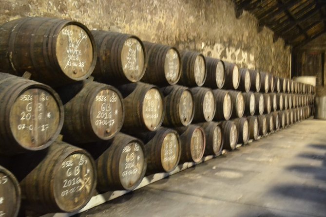 Porto: Port and Douro Wine Walking Tour With 9 Wine Tastings - Stop 3: Fonseca Porto and Why the Bigger Name Still Teaches