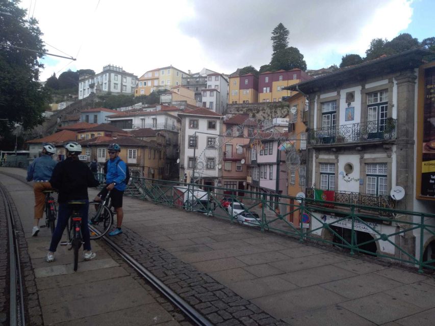 Porto: Riverside Panoramic E-Bike Tour - Starting at R. de Alexandre Herculano 251, helmets on, worries off