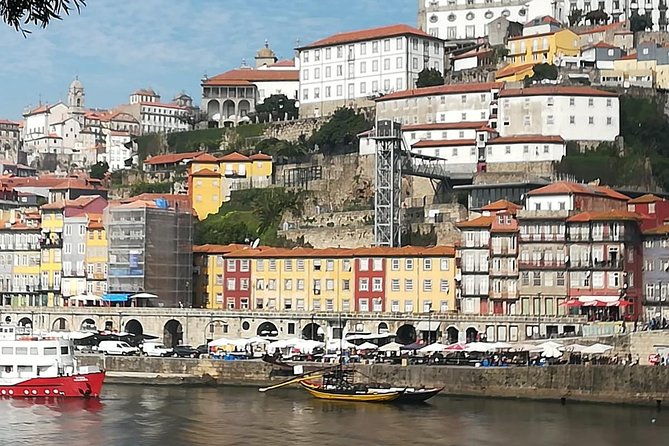 Porto to Lisbon Up to 4 Stops: Aveiro, Nazare, Fatima & Obidos - Óbidos walls, castle views, and ginjinha in a chocolate cup