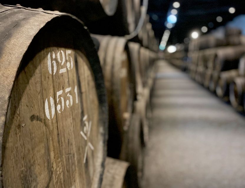 Porto: Wine Tasting with Tapas Walking Tour - The local restaurant stop: tapas, codfish cakes, cheese, and more