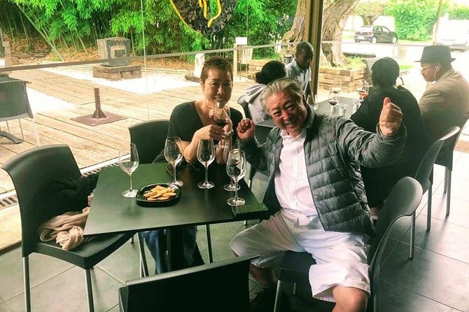 Private Lisbon Arrabida Wine Tour: Food & Wines, Mountain and Sea - Sesimbra castle views, Igreja de Santa Maria tiles, and the quick photo circuit