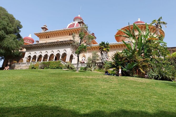 Private Tour Sintra, Palaces and Mountain Tuk Tuk(2 to 6 people) - En route sights: National Palace chimneys and Biester Palace movie lore