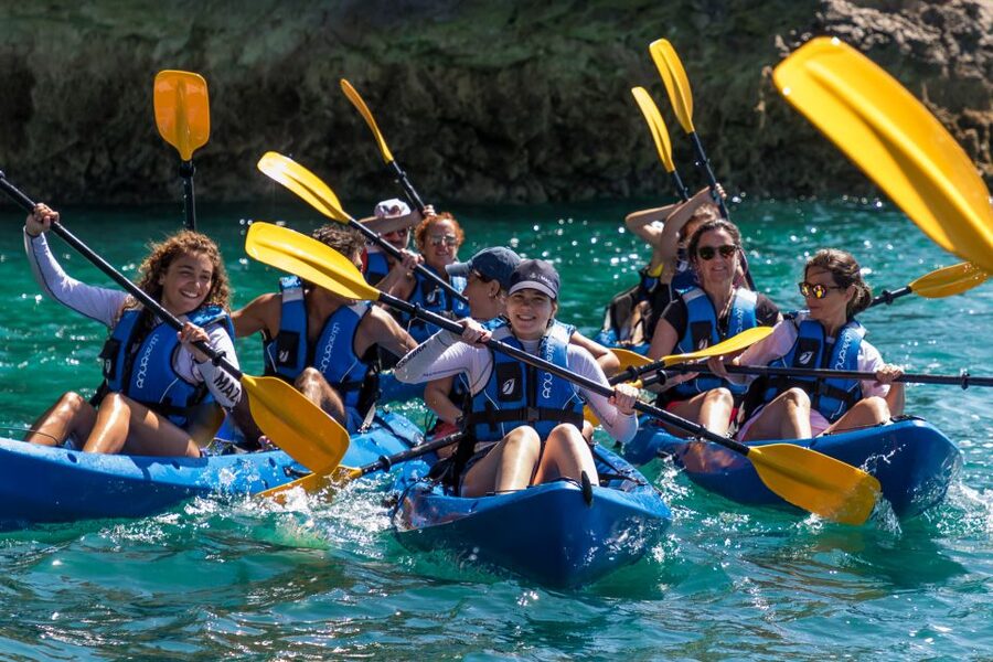 Sesimbra: Arrabida Natural Park & Caves Guided Kayaking Tour - Gear check: double kayaks, life jackets, and waterproof storage