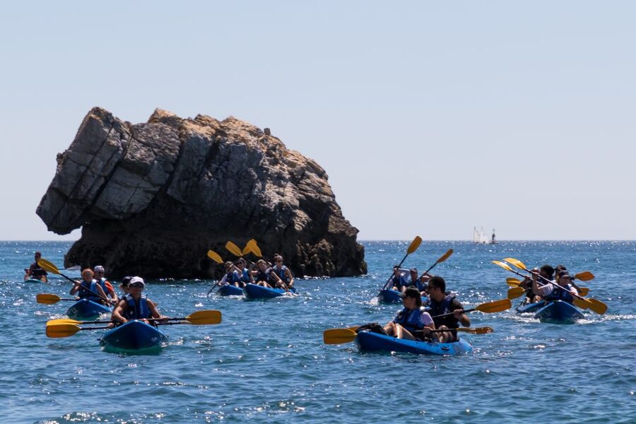 Sesimbra: Arrabida Natural Park & Caves Guided Kayaking Tour - Ribeiro do Cavalo beach stop: swim time and traditional sweets