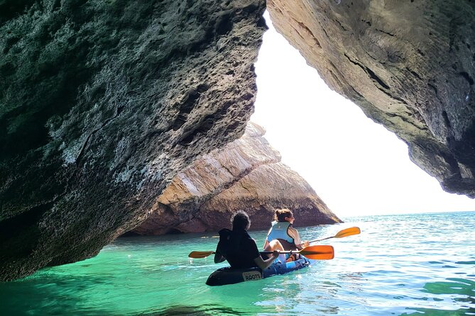 Sesimbra : Guided Kayak Tour in Arrábida Natural Park & Caves - Stop 2: Sesimbra Coast, Caves, and That Close-Up Feeling