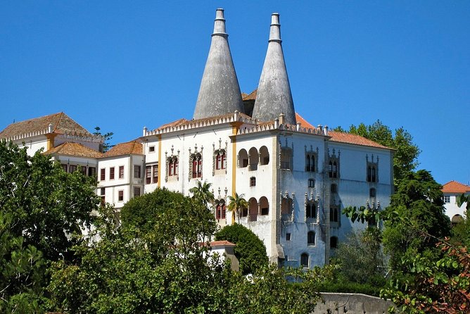 Sintra, Pena Palace, Quinta da Regaleira & Cascais Group Tour - Guincho Beach: a fast Atlantic photo break near Cascais