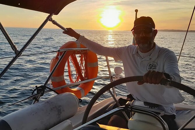 Sunset on a Luxury Sailing Yacht from Vilamoura (Max 12 Guests) - What’s included: drinks, snacks, music, and value at $60.49