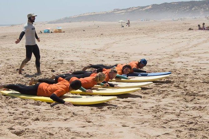 Surf lessons in the Algarve - The lesson flow: sand practice first, then controlled time in the ocean